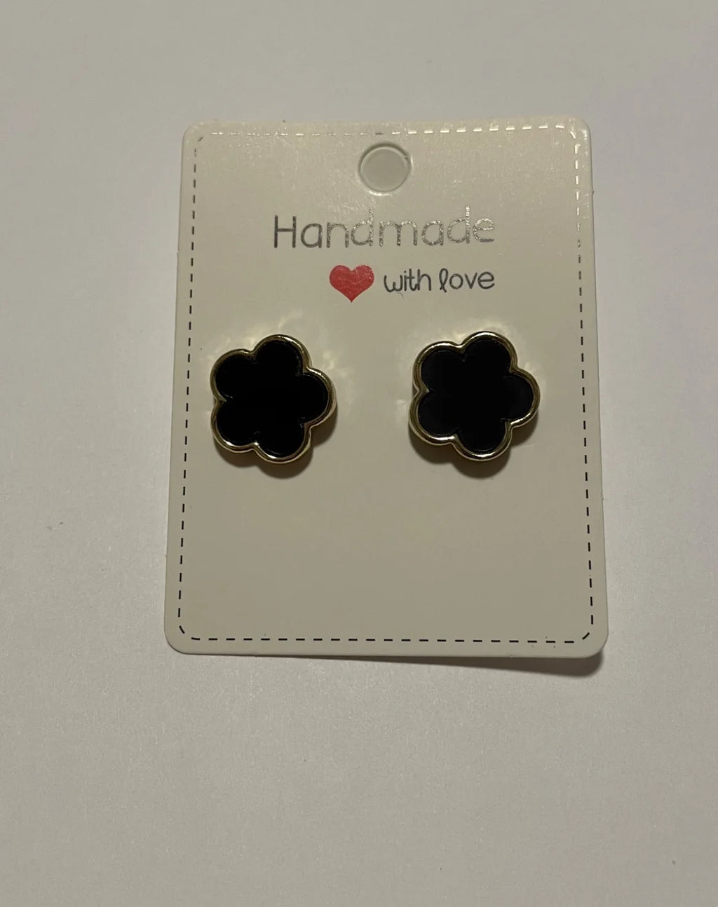 Boucles d’oreilles fleur noire et dorée 