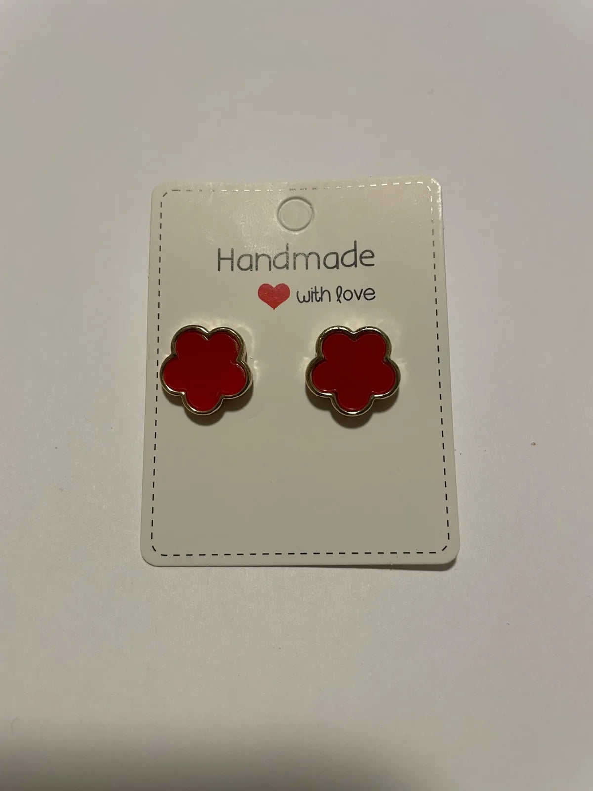 Boucles d'oreilles fleurs rouges dorées assorties à la parure bijoux femme