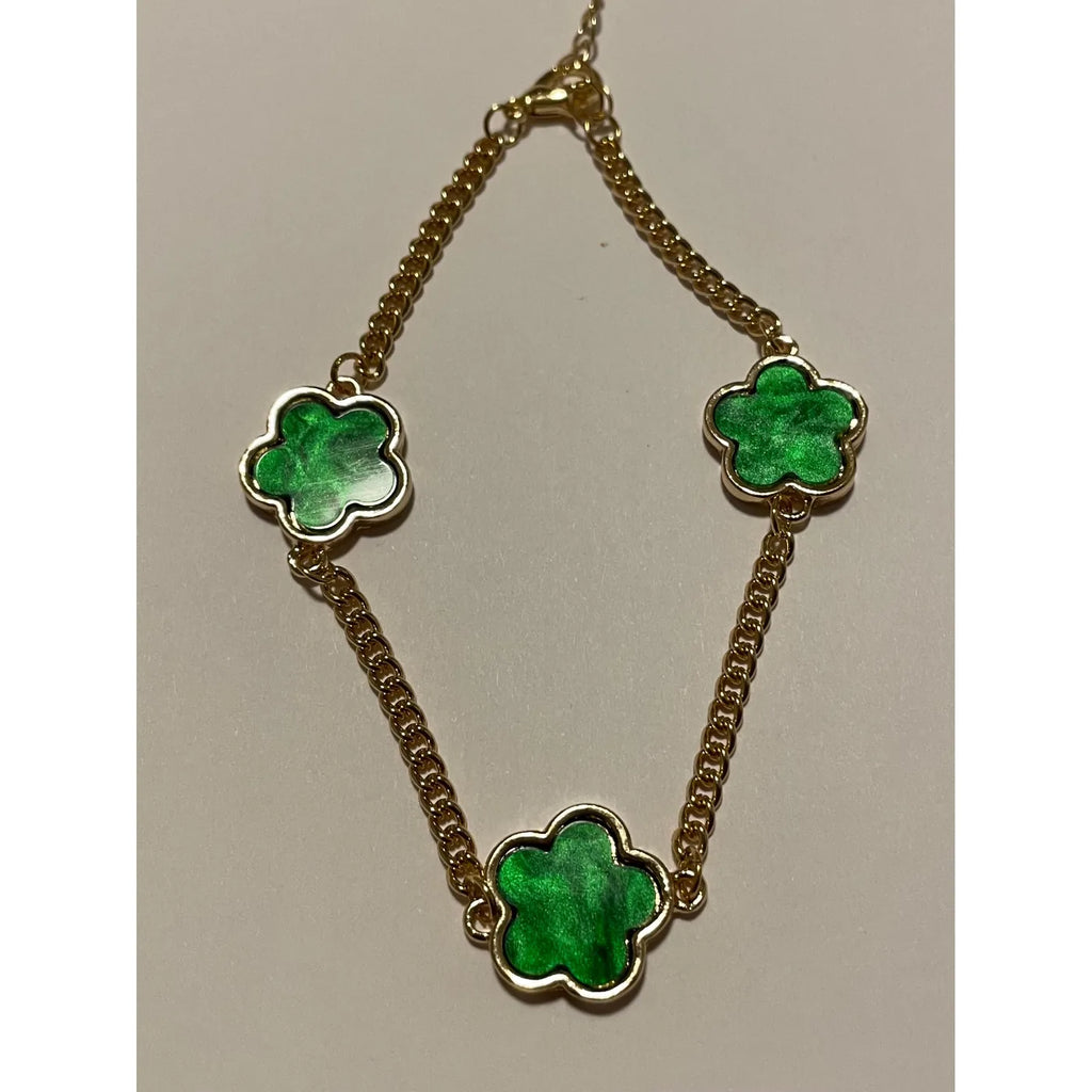 Bracelet doré femme avec trois fleurs vertes