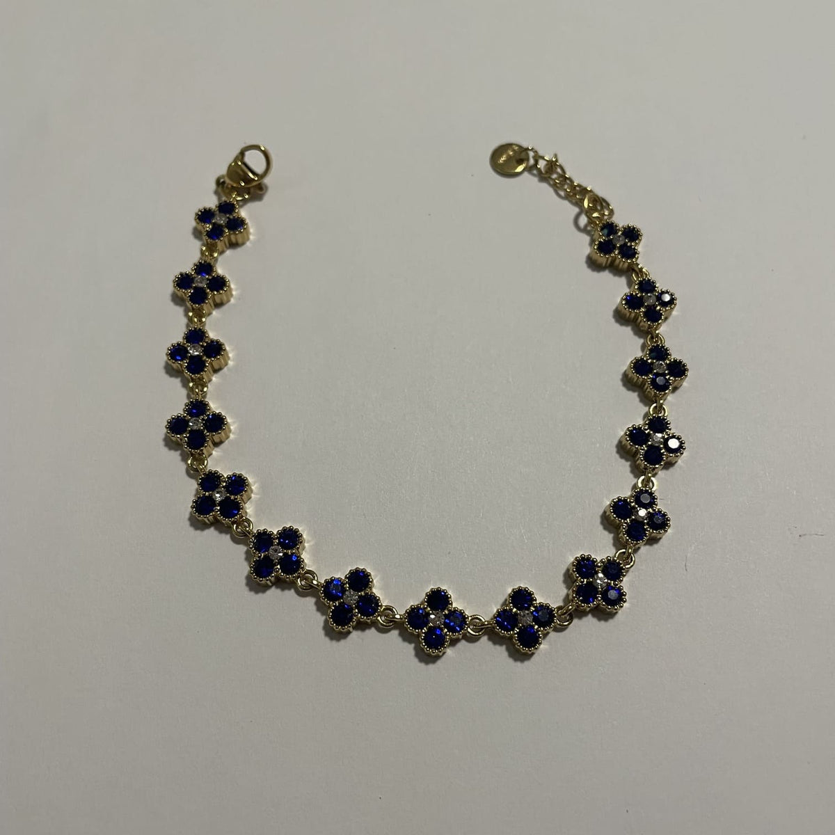 Bracelet doré fleurs bleu saphir en acier inoxydable