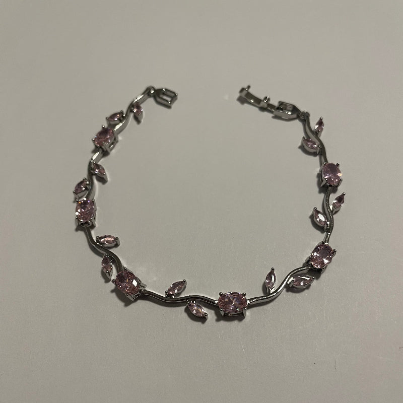 Bracelet liane rose poudré avec détails argentés