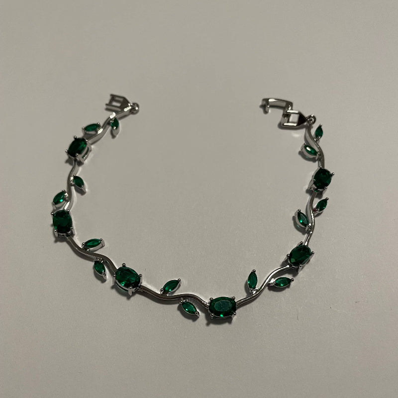 Bracelet liane vert émeraude avec détails argentés