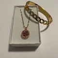 Coffret bijoux fantaisie doré avec collier violet et bracelet jonc