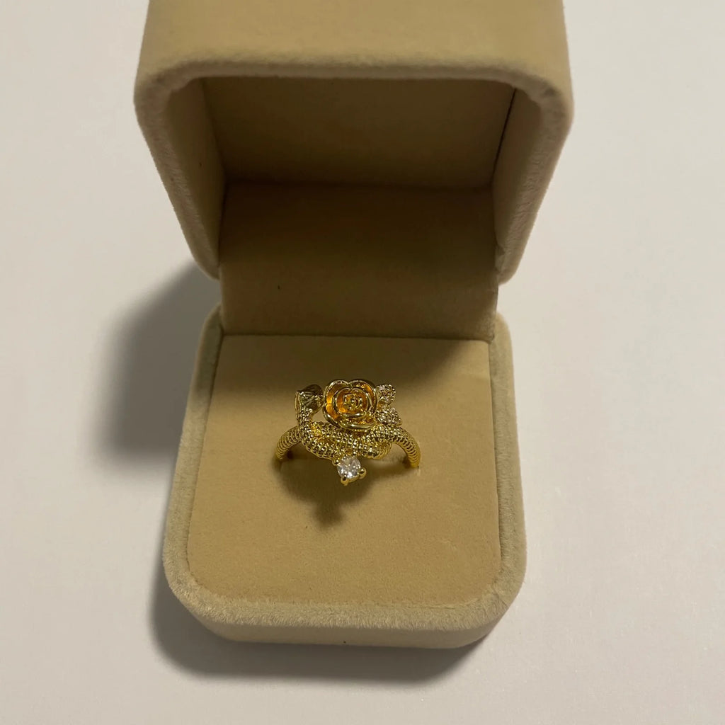 Bague fleur dorée ajustable avec motif floral en relief