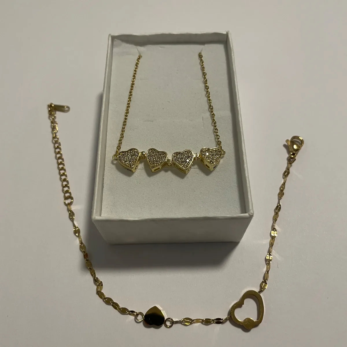 Coffret bijoux femme doré avec collier transformable trèfle et bracelet cœur