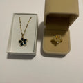 Coffret bijoux fleurs dorées avec collier fleur verte et bague