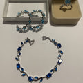 Parure bijoux bleu 3 pièces avec bracelet, boucles et bague